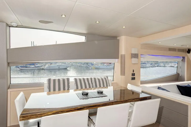 Slide: The Image of Luxurious interior of 2017 Sunseeker 75 Yacht with elegant dining area and waterfront view. - 19