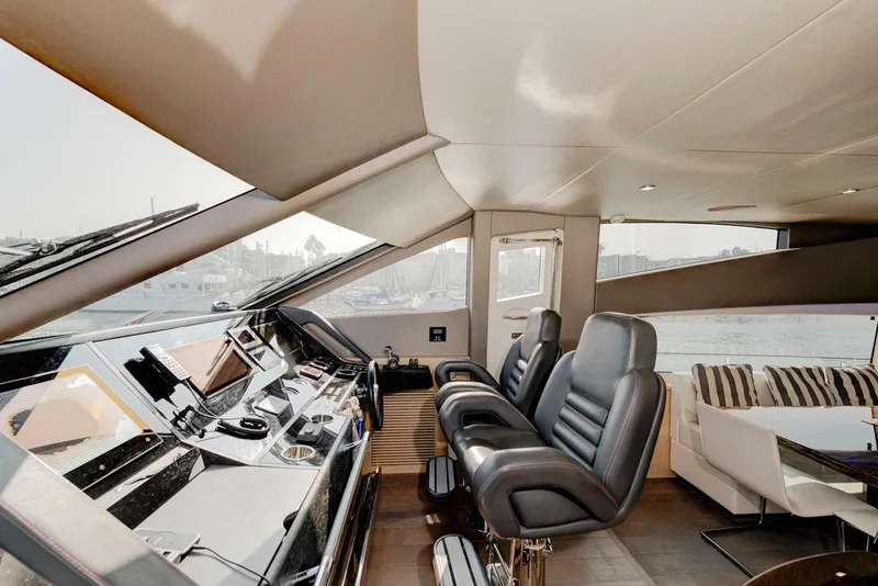 Slide: The Image of Luxurious 2017 Sunseeker 75 Yacht interior with modern helm and plush seating. - 23