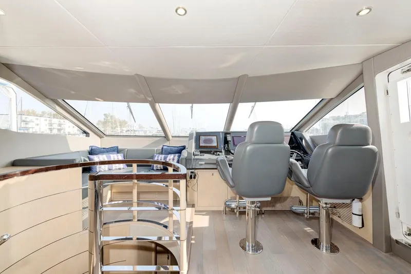 Slide: The Image of Luxurious interior of 2017 Sunseeker 75 Yacht with modern helm and seating. - 34