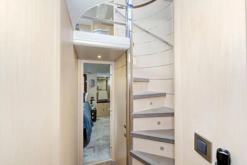 Slide: The Image of Interior of 2017 Sunseeker 75 Yacht with spiral staircase and modern design. - 36