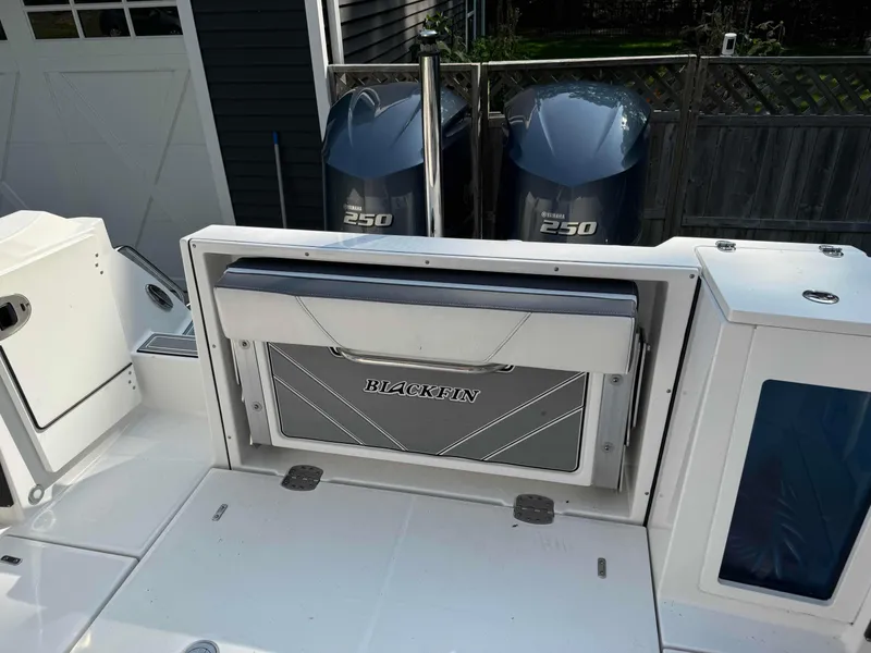Slide: The Image of 2020 Blackfin 272 DC boat with dual 250 horsepower engines, rear seating area. - 10