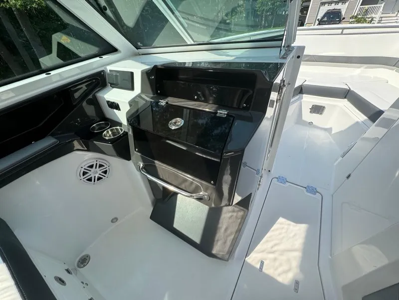 Slide: The Image of 2020 Blackfin 272 DC boat interior with sleek design and modern amenities. - 23