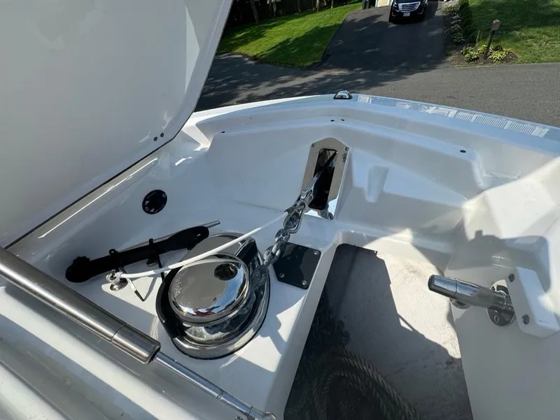 Slide: The Image of 2020 Blackfin 272 DC boat anchor compartment with winch and chain. - 44