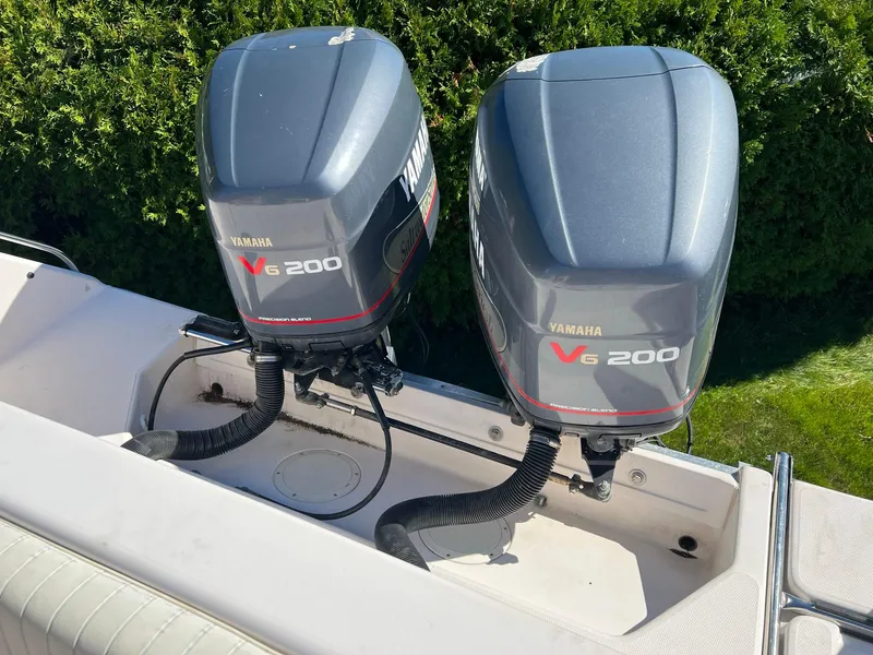 Slide: The Image of Twin Yamaha V6 200 engines on a 1998 Grady-White Voyager 268 boat. - 12