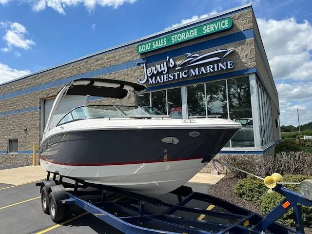Slide: The Image of 2025 Regal LS4 boat on trailer at Jerry's Majestic Marine dealership. - 1