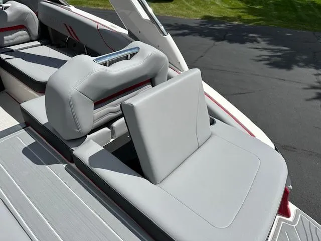 Slide: The Image of 2025 Regal LS4 boat with luxurious gray seating and adjustable backrest. - 18