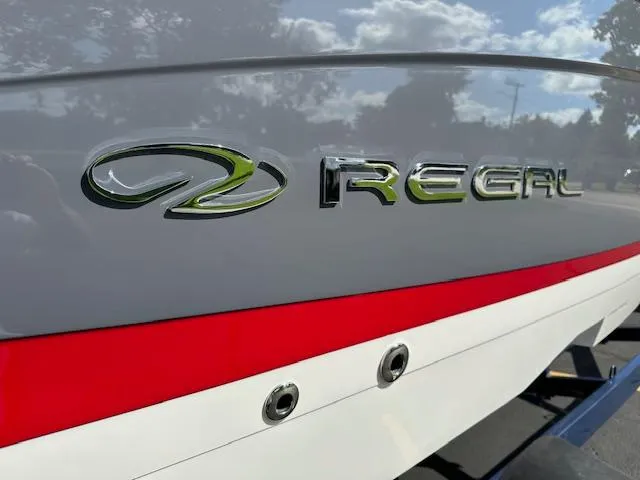 Slide: The Image of 2025 Regal LS4 boat with sleek design and logo detail. - 20