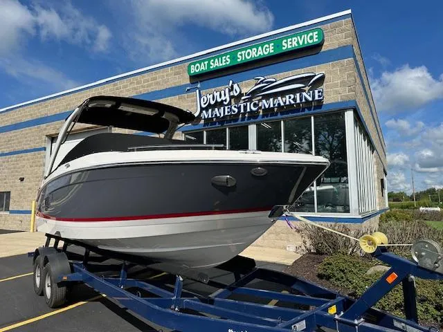 Slide: The Image of 2025 Regal LS4 boat on trailer at Jerry's Majestic Marine dealership. - 29