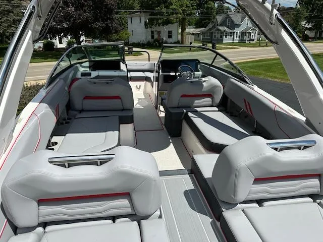 Slide: The Image of 2025 Regal LS4 boat interior with spacious seating and modern design. - 3