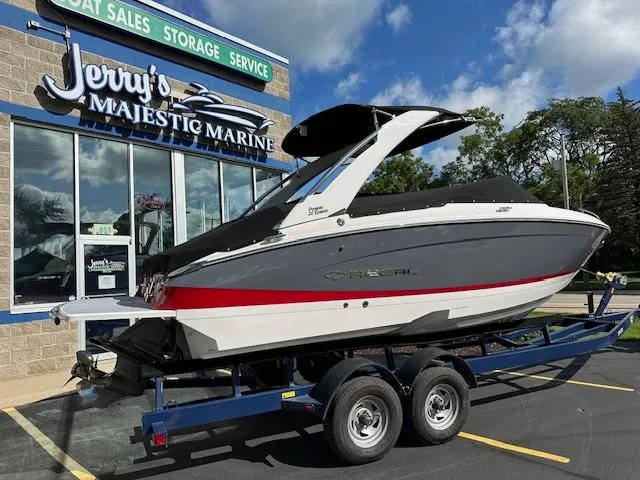 Slide: The Image of 2025 Regal LS4 boat on trailer at Jerry's Majestic Marine dealership. - 32