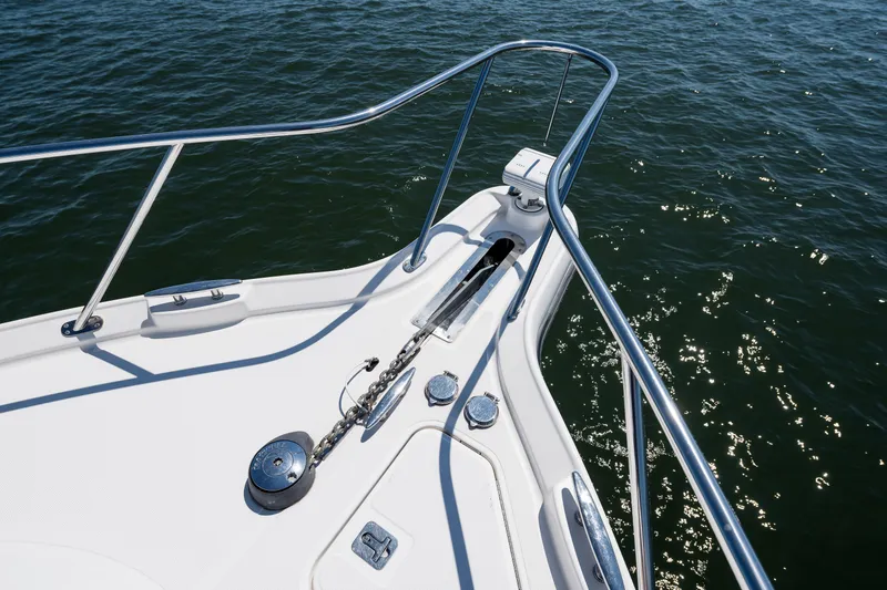 Slide: The Image of 2007 Tiara Yachts 4300 Sovran bow with anchor, railing, and ocean view. - 18