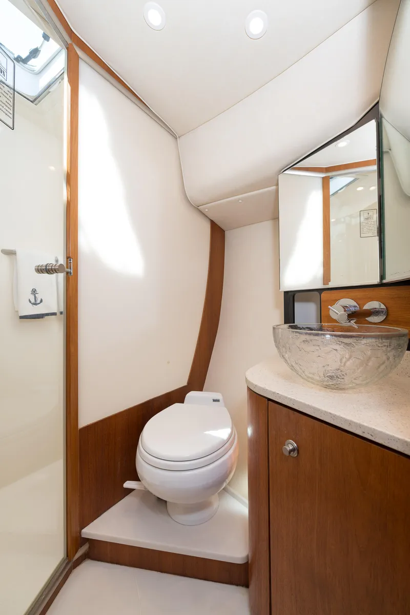 Slide: The Image of Luxurious 2007 Tiara Yachts 4300 Sovran bathroom with modern fixtures and elegant design. - 36