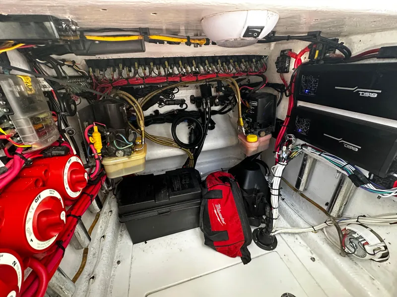 Slide: The Image of 2004 Contender 31 Tournament boat electrical system with wiring and equipment. - 25