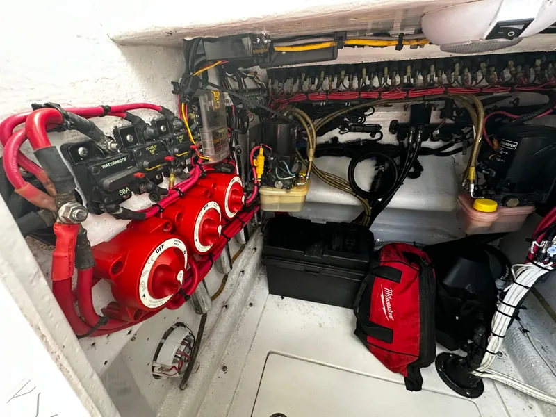 Slide: The Image of Electrical system of a 2004 Contender 31 Tournament boat, featuring wiring and components. - 26