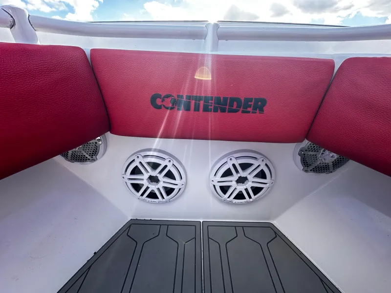 Slide: The Image of 2004 Contender 31 Tournament boat interior with red cushions and speaker system. - 35