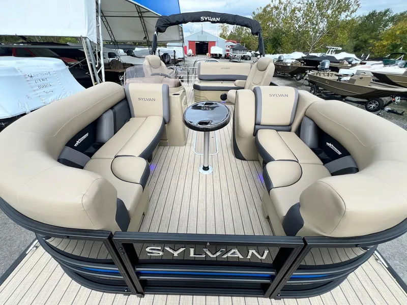 Slide: The Image of 2025 Sylvan X3 CLZ DH Mirage Tritoon with luxurious seating and modern design. - 37