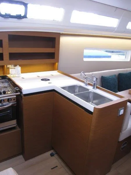 Slide: The Image of Modern kitchen in 2025 Jeanneau 380 yacht with dual sinks and stove. - 11