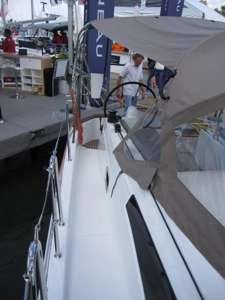 Slide: The Image of 2025 Jeanneau 380 sailboat docked, featuring sleek design and modern amenities. - 27