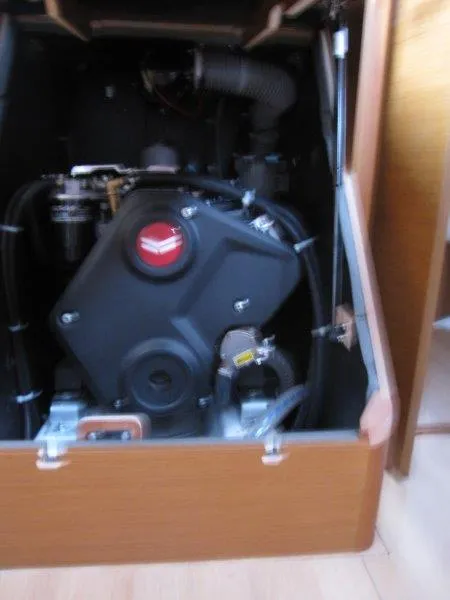 Slide: The Image of Engine compartment of 2025 Jeanneau 380 sailboat, showcasing modern design and components. - 28