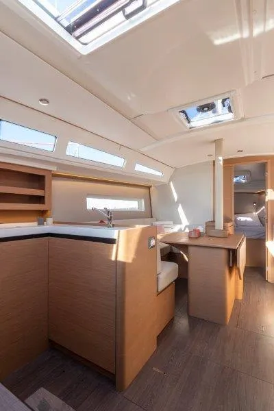 Slide: The Image of Interior of 2025 Jeanneau 380 yacht, featuring modern design and natural light. - 45