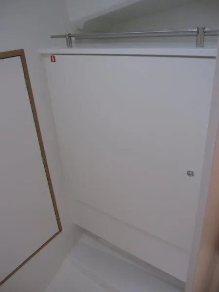 Slide: The Image of Interior of 2025 Jeanneau Sun Odyssey 350 yacht, featuring sleek white cabinetry. - 22