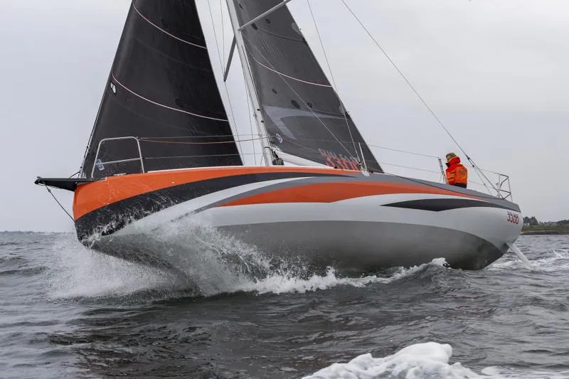 Slide: The Image of 2025 Jeanneau Sun Fast 3300 sailing on open water, showcasing sleek design and vibrant colors. - 37