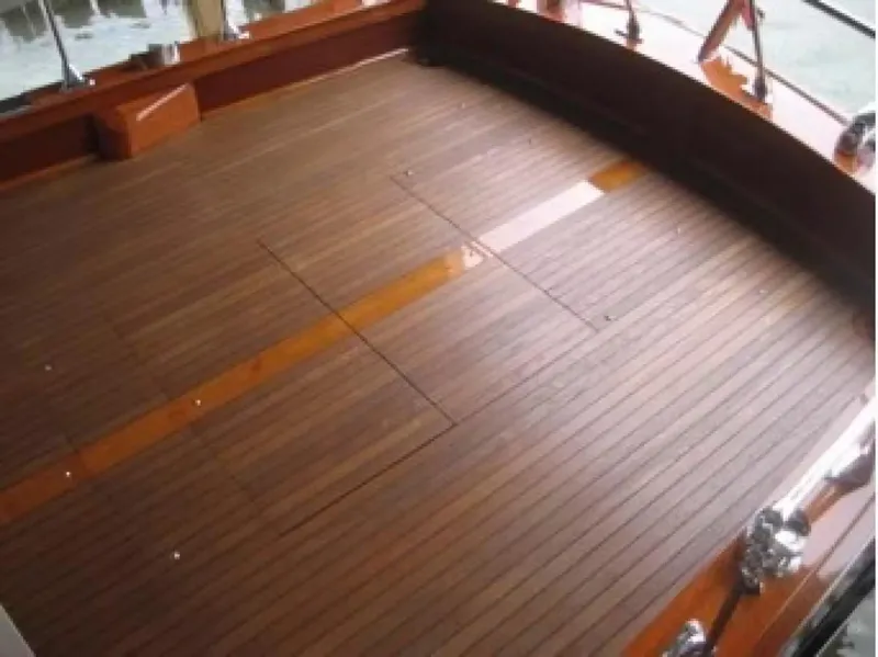 Slide: The Image of 1957 Chris-Craft 33 Futura boat deck with polished wood finish. - 25