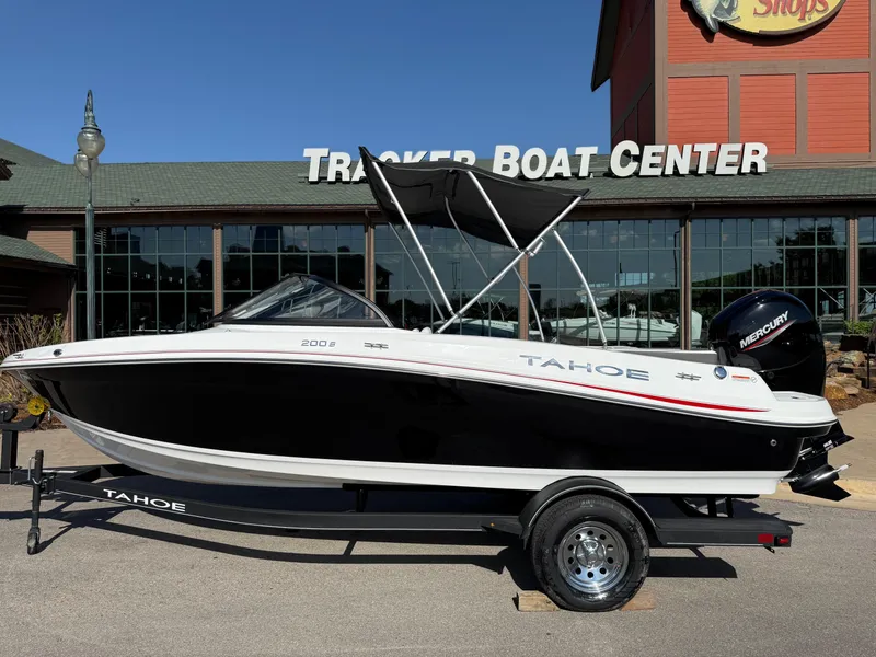 Slide: The Image of 2024 Tahoe 200 S boat at Tracker Boat Center, black and white design. - 0