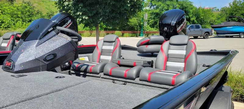 Slide: The Image of 2024 Ranger RT188 boat with Mercury engine, featuring sleek seating and modern design in a scenic outdoor setting. - 3