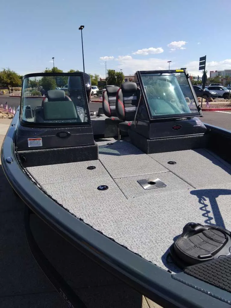 Slide: The Image of 2024 Ranger VS1782SC Angler boat with dual windshields and spacious deck. - 3