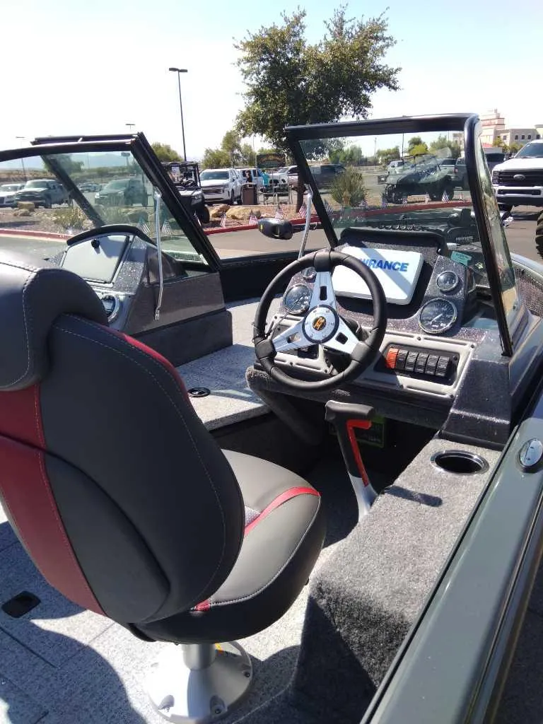 Slide: The Image of 2024 Ranger VS1782SC Angler boat interior with steering wheel and seating. - 5