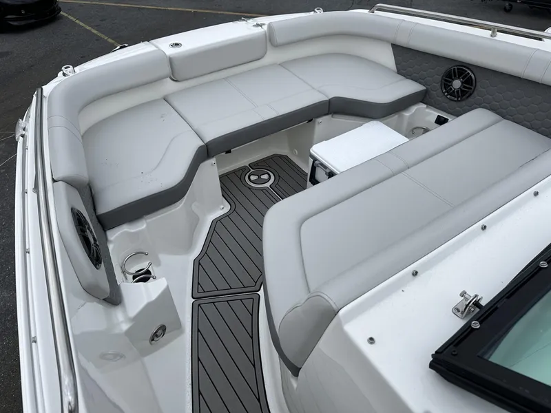 Slide: The Image of 2024 Sea Ray SDX 250 Outboard boat interior with spacious seating and modern design. - 12