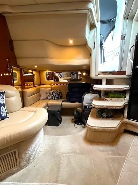 Slide: The Image of Luxurious 2003 Sea Ray 38 Sundancer yacht interior with plush seating and elegant design. - 13