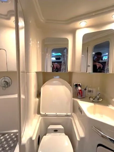 Slide: The Image of Luxurious bathroom in 2003 Sea Ray 38 Sundancer yacht with modern fixtures. - 18