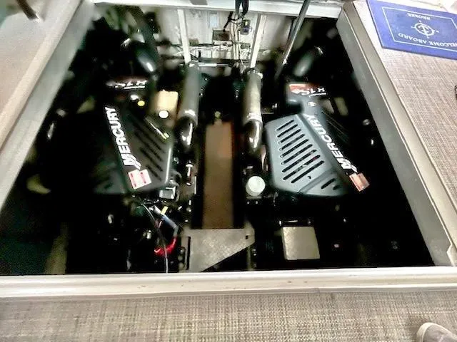Slide: The Image of Engine compartment of 2003 Sea Ray 38 Sundancer with twin Mercury engines. - 19