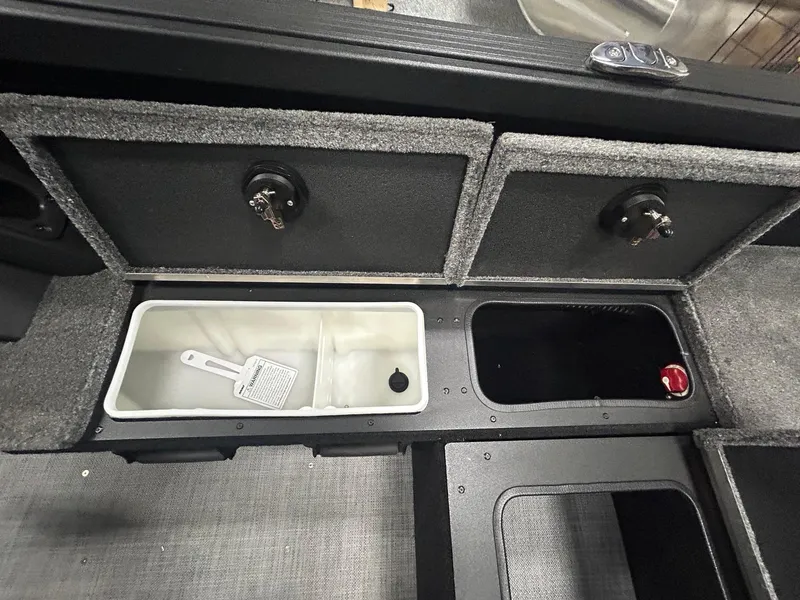 Slide: The Image of Interior view of 2025 Alumacraft Competitor 175X CS boat storage compartment. - 10