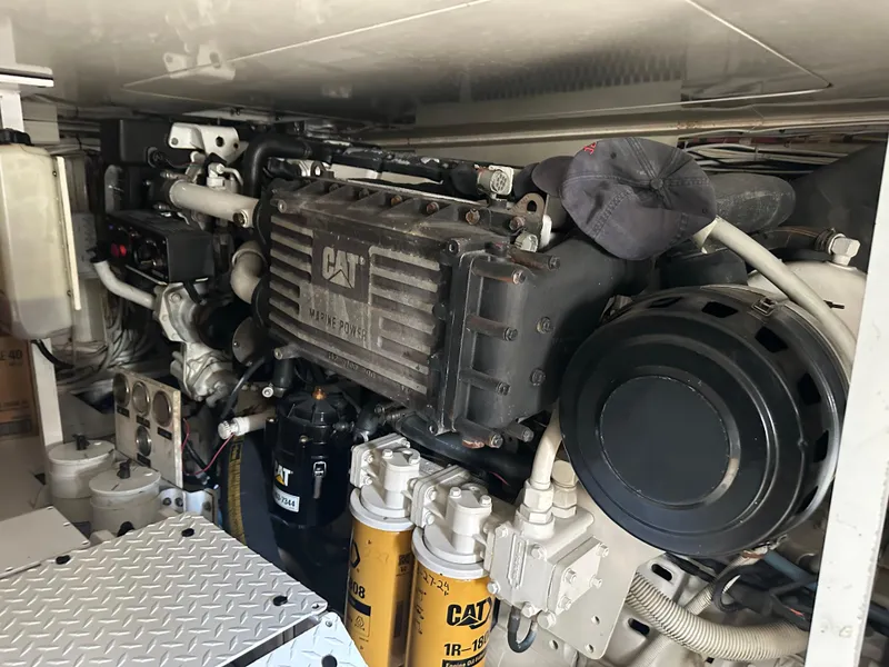 Slide: The Image of Engine compartment of a 2005 Post 53 Convertible with CAT machinery. - 24