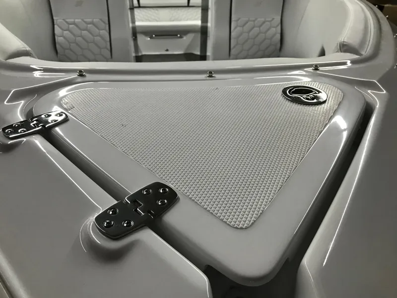 Slide: The Image of 2025 Four Winns H4 boat interior with sleek design and textured surfaces. - 12