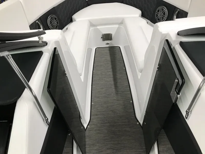 Slide: The Image of 2025 Four Winns H4 boat interior with sleek seating and modern design. - 26