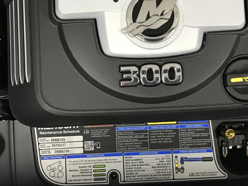 Slide: The Image of 2025 Four Winns H4 engine detail with maintenance schedule and specifications. - 33