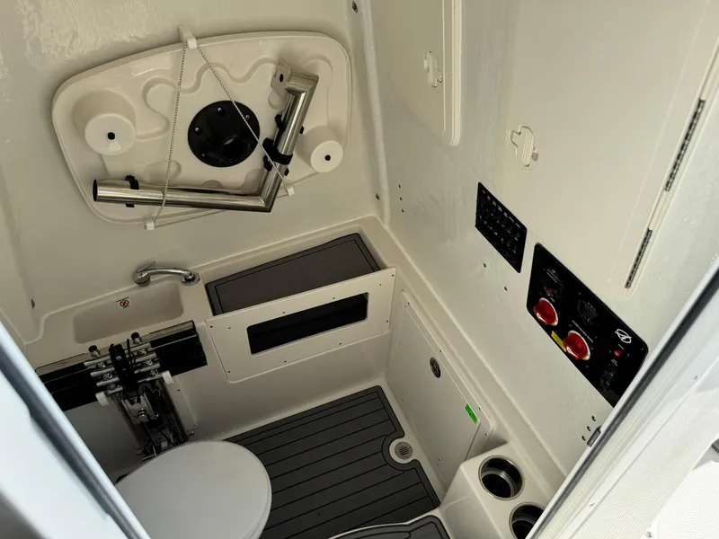 Slide: The Image of 2025 Sailfish 272 CC boat interior with modern controls and compact design. - 29