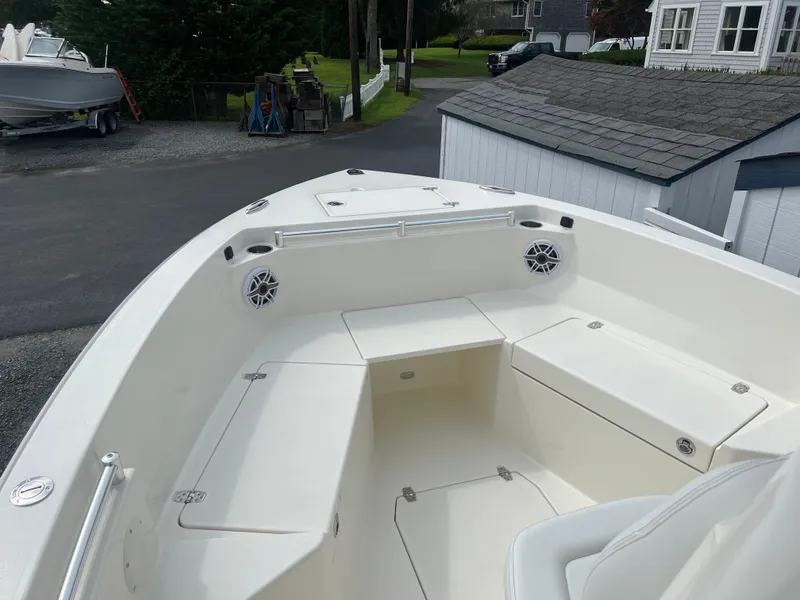 Slide: The Image of 2025 Cobia 240 Center Console boat with spacious seating and storage. - 32