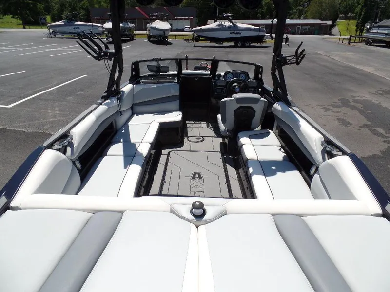 Slide: The Image of 2019 Axis A24 boat interior with spacious seating and modern design. - 11
