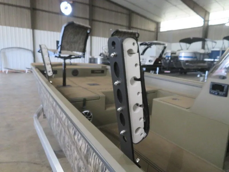 Slide: The Image of 2025 Thor LAKE HAMMER 1860 SIDE CONSOLE boat interior with mounted accessories in a showroom. - 15