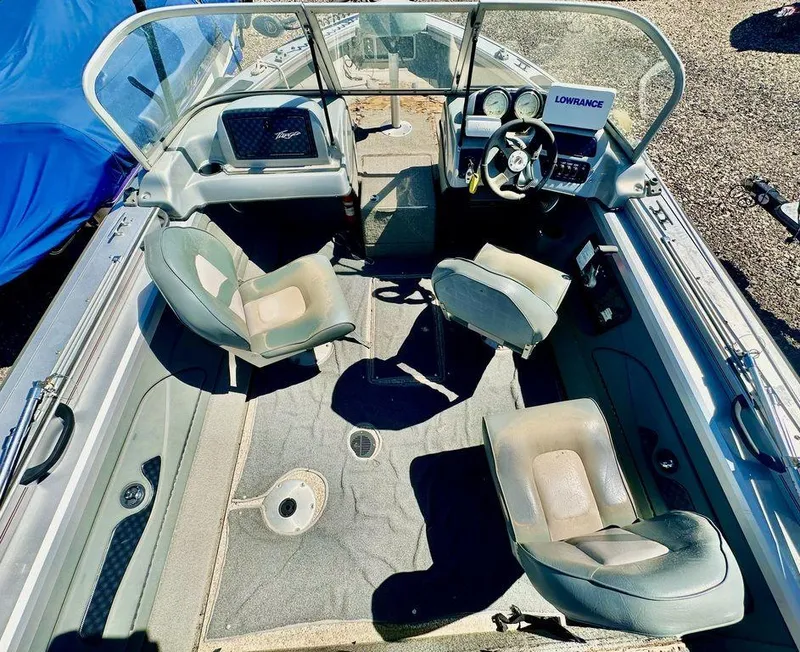 Slide: The Image of 2007 Tracker v175 boat interior with seating and steering console. - 3