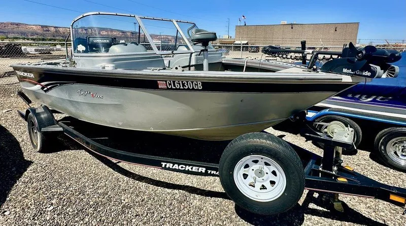 Slide: The Image of 2007 Tracker v175 boat on trailer in outdoor setting. - 6