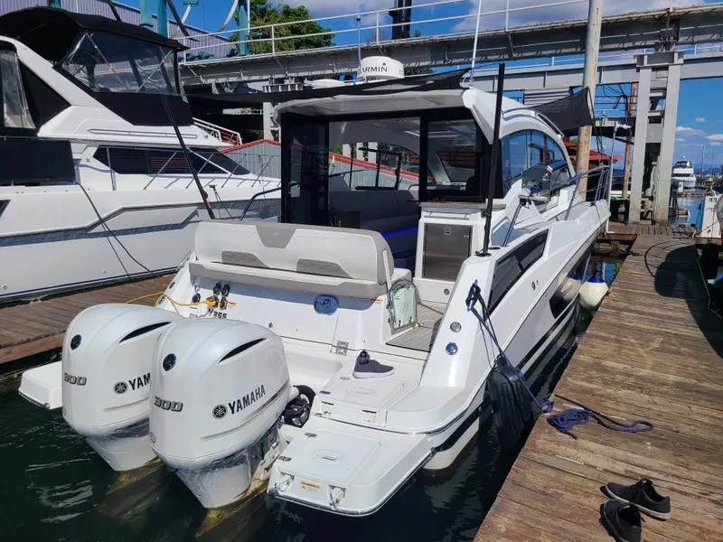 Slide: The Image of 2021 Four Winns Vista 355 Coupe OB docked with twin Yamaha outboard engines. - 4