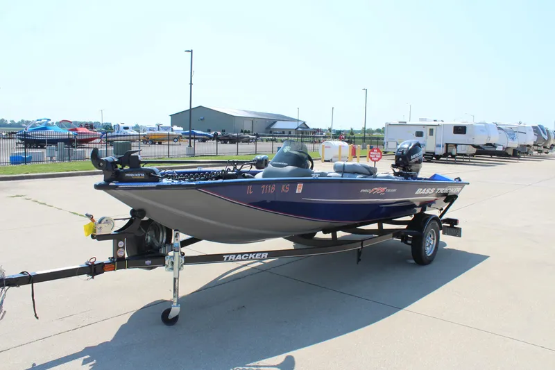 Slide: The Image of 2015 Tracker Pro Team 175 TF boat on trailer in parking lot. - 3