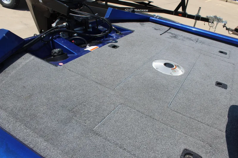 Slide: The Image of 2015 Tracker Pro Team 175 TF boat deck with gray carpet. - 8