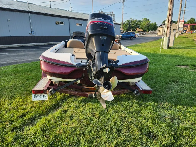Slide: The Image of 2001 Nitro 896 DC boat with Mercury outboard motor on grass. - 4